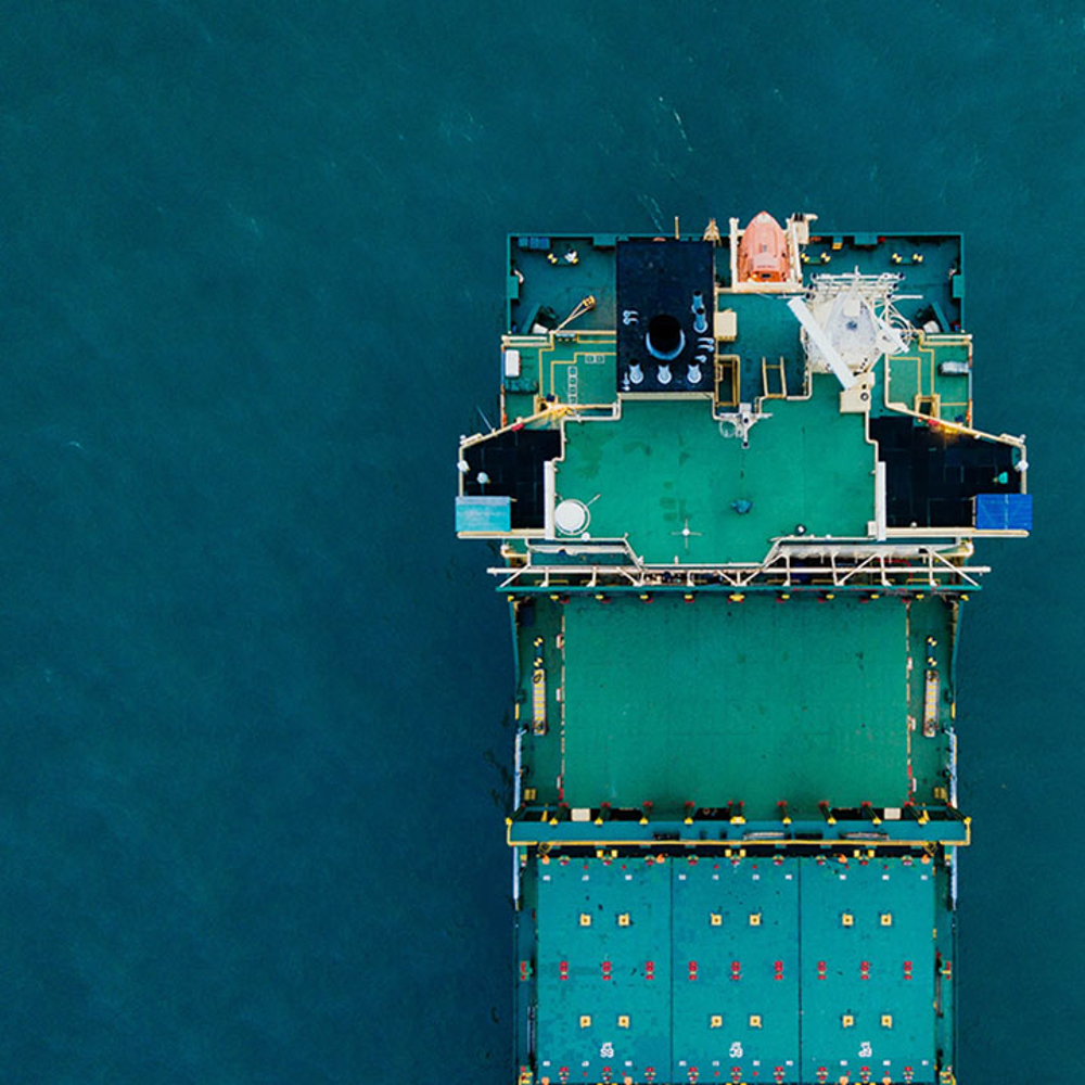 Container ship from above on sea