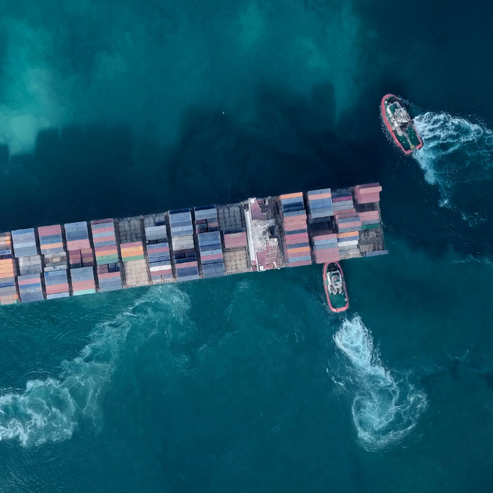 Birdseye view of ship on turquoise sea