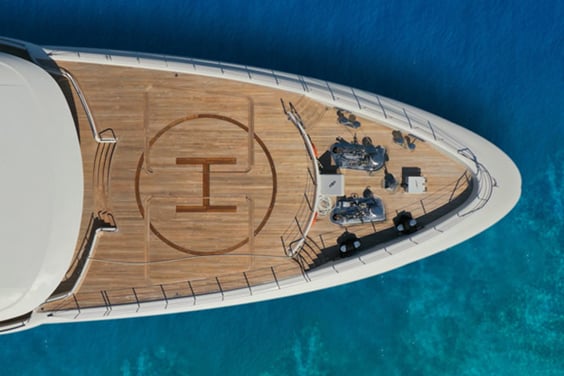 Superyacht from above on turquoise sea