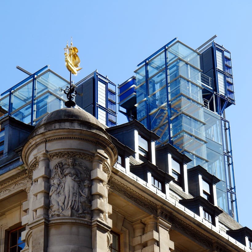 The Colcutt building (1901) stands in front of the Richard Rogers building (2000), comprising our London offices in Fenchurch Street