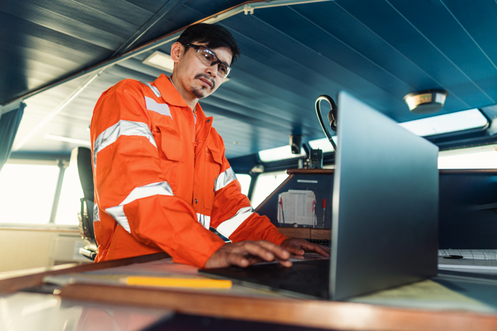 Surveyor inspecting ship system