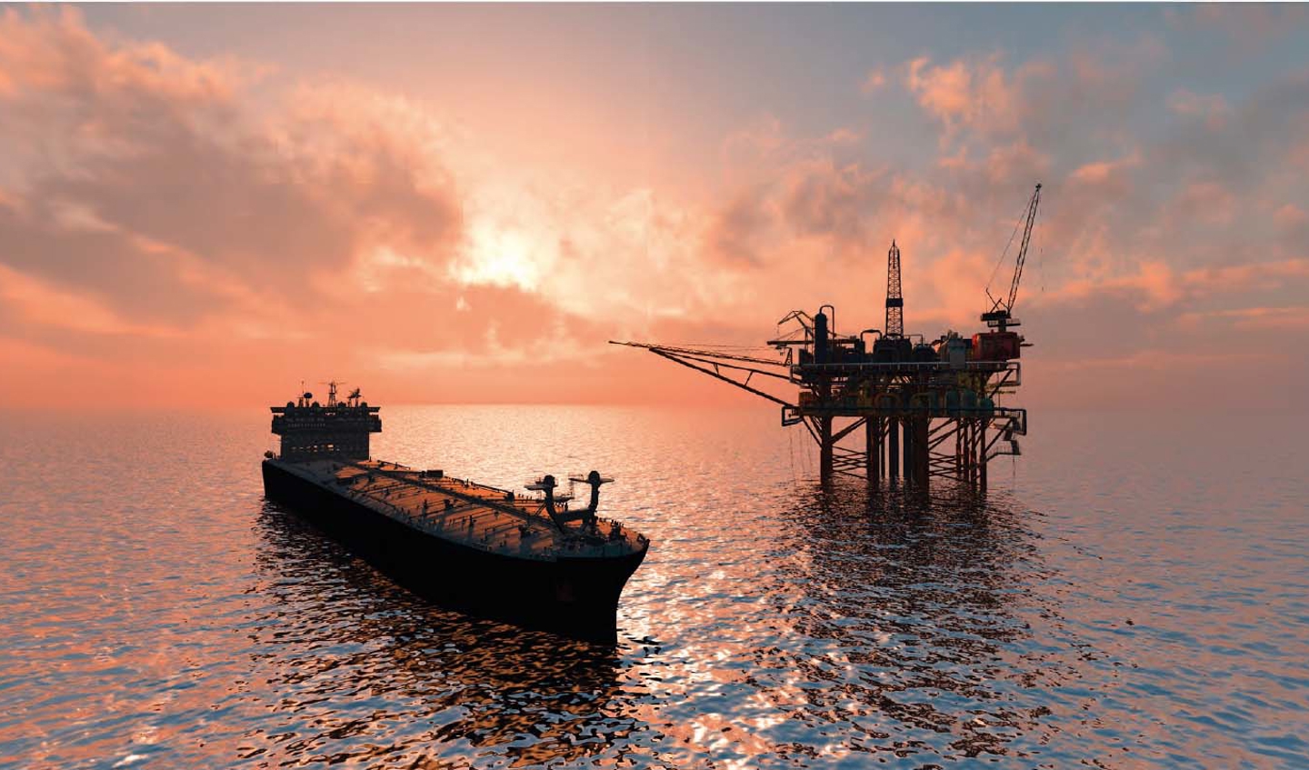 Offshore rig and ship in the sunset. 