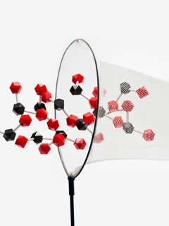 Carbon molecules being caught in a net graphic. 