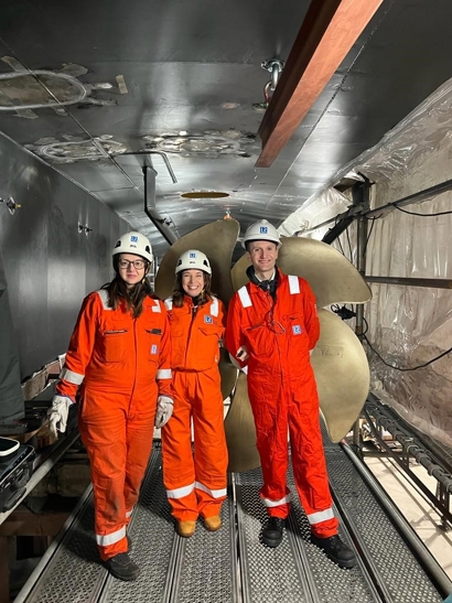 Engineers inside a ship build.