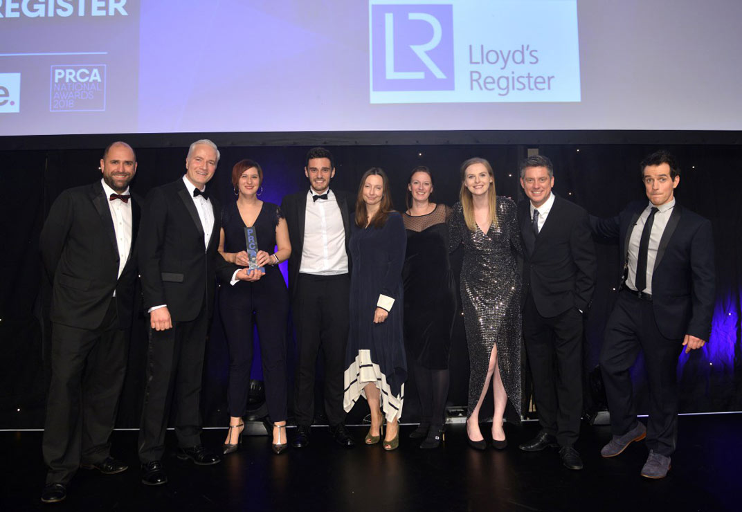 Group photo of Lloyd's Register's award recipients on stage receiving award for Best B2B Campaign at the 2018 PRCA Awards