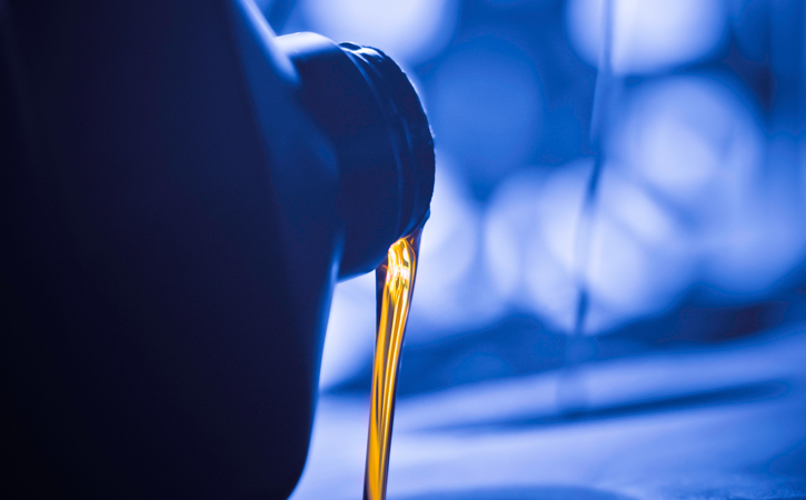Close up of oil being poured.