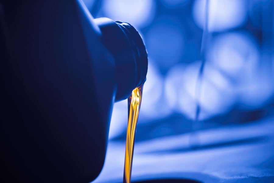 Close up of oil being poured.