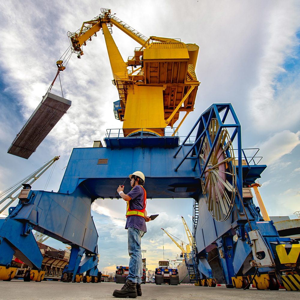 Engineer operating machinery at the port