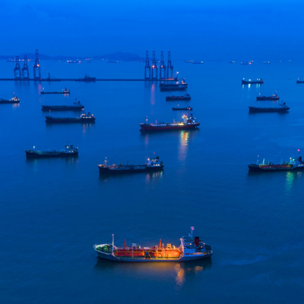 Ships on the sea at night.