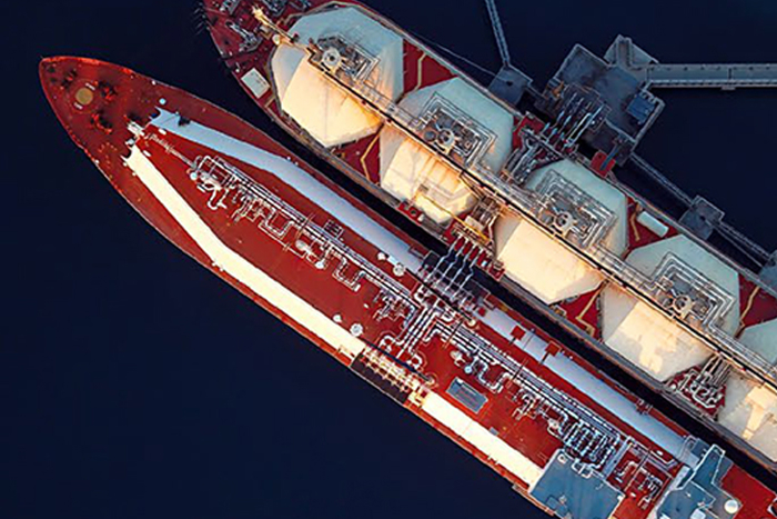 Overhead view of two tanker vessels at dock.